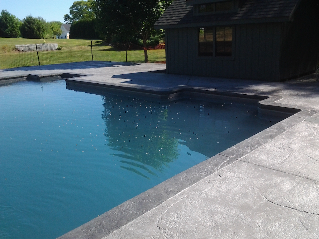 Swimming pool and stamped concrete project example 144
